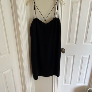 Black cocktail dress. Spaghetti straps